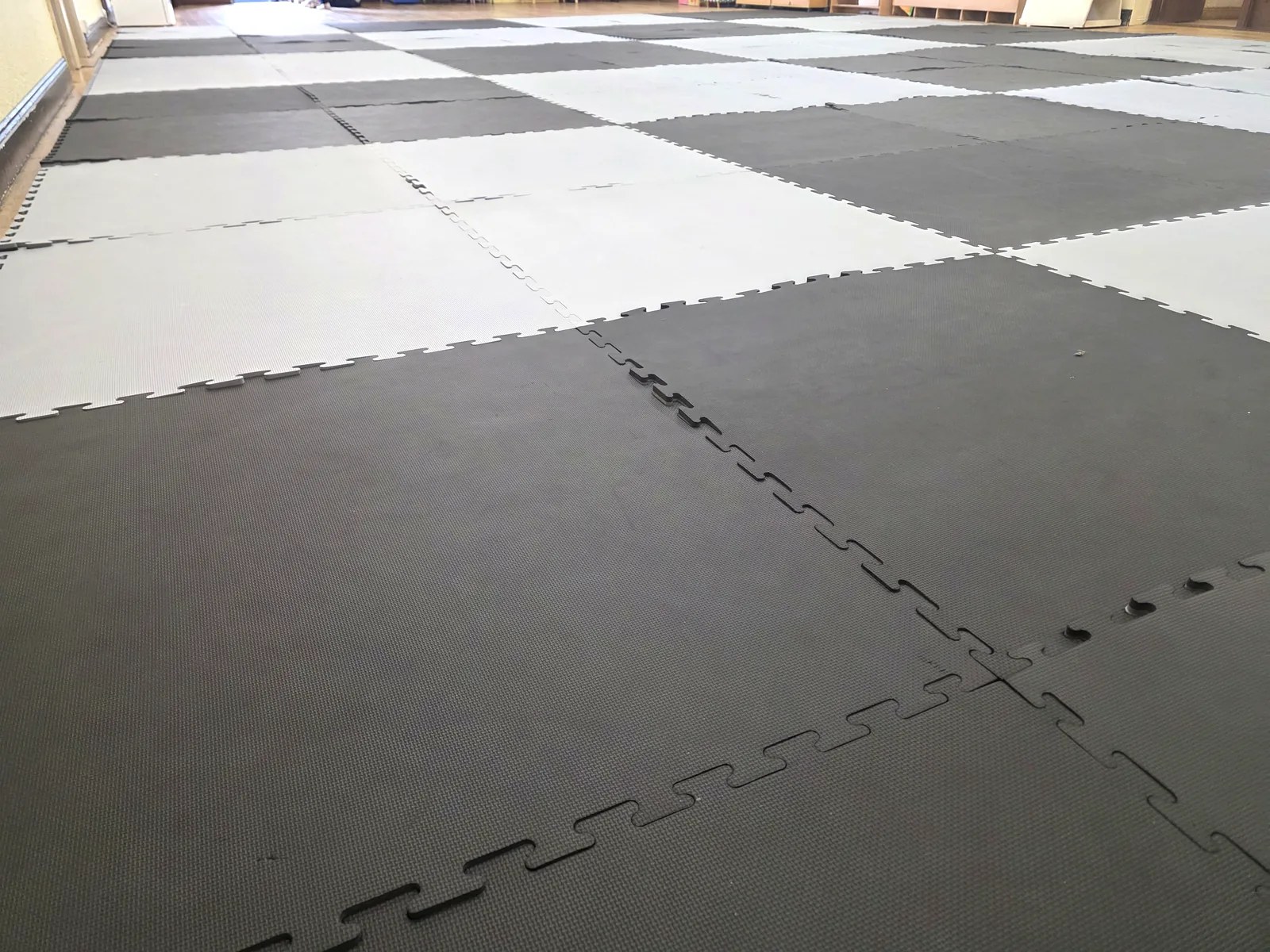 Close view of the interlocking training mats used for Taekwon-Do classes in Riverchapel